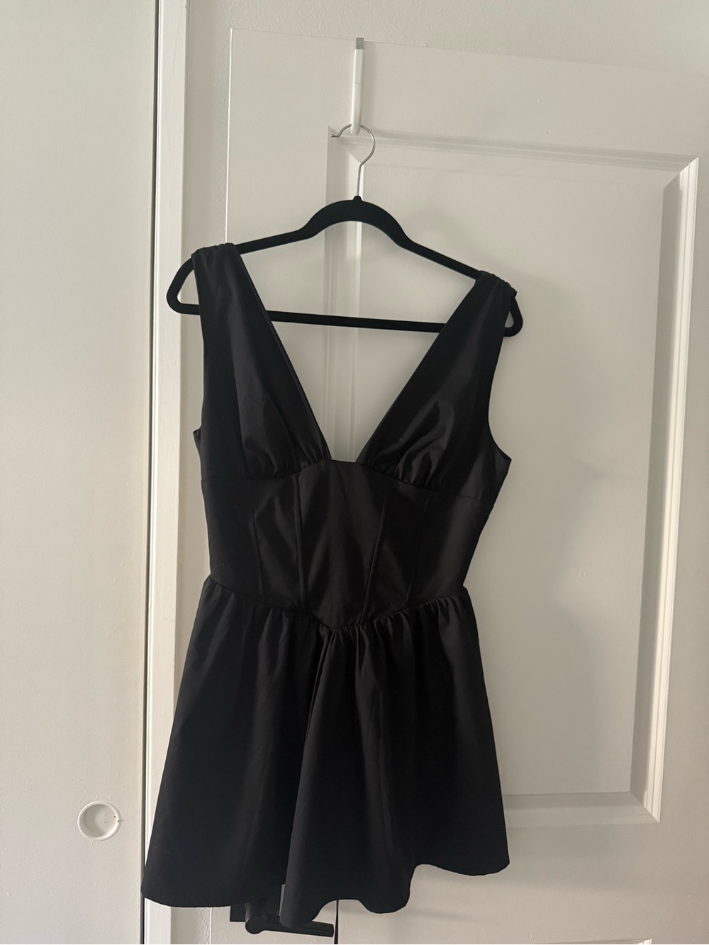 naked wardrobe Black Deep V Mini Dress